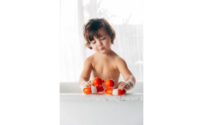 Jouet de bain pour bébé et enfant - Bouée canard rouge - Petit Toi Lausanne